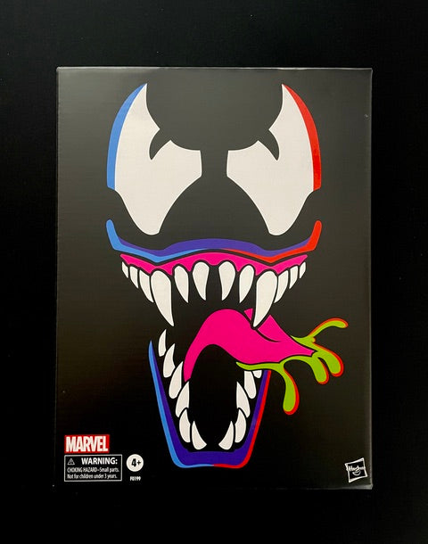 Marvel Comics Spider-Man Retro Collection Venom action figure by Hasbro with alternate head, interchangeable hands, and vintage-style packaging front of box
