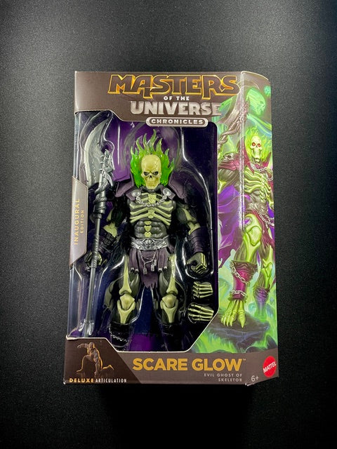 Masters of the Universe Chronicles Scare Glow Inaugural Edition action figure with green flame effects, skeletal armor, and scythe