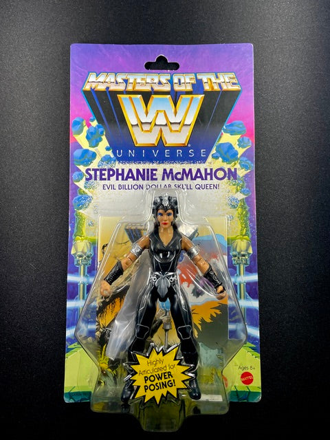 Masters of the WWE Universe Stephanie McMahon action figure with black armor, silver headpiece, and cape