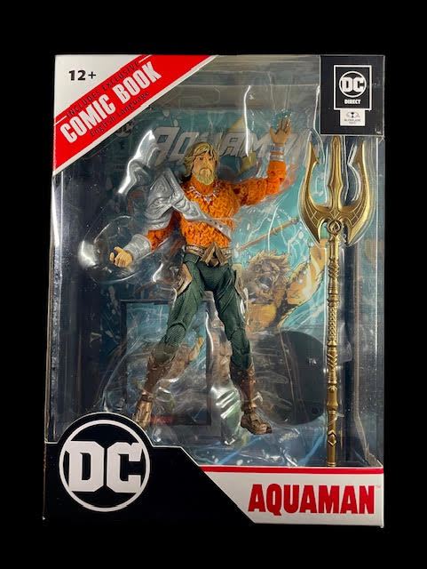 DC Page Punchers McFarlane Toys Aquaman figure in orange and green outfit with trident and comic book
