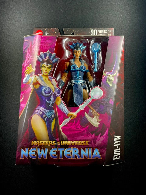 Masters of the Universe New Eternia Evil-Lyn action figure with blue armor, elaborate headpiece, and magical staff