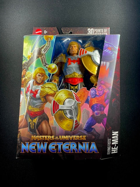 Masters of the Universe New Eternia Flying Fists He-Man action figure with silver armor, gold shield, and battle accessories