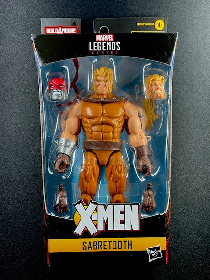 Marvel Legends Sabretooth action figure in packaging on a dark background