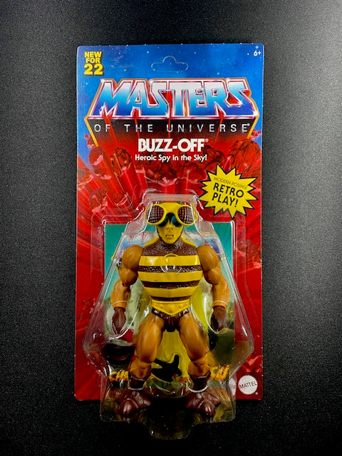 Vintage Masters of the Universe Buzz-Off figure packaging on a dark background