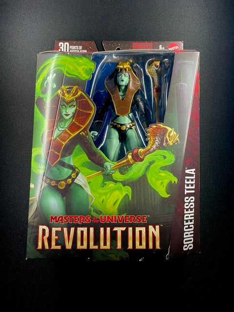 Masters of the Universe Revolution Sorceress Teela action figure with gold and white armor, winged headpiece, and staff