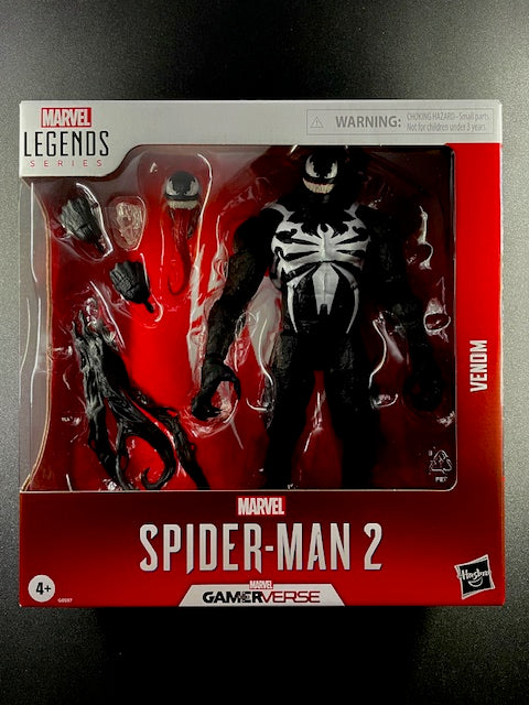 Marvel Legends Venom action figure in packaging on a dark background