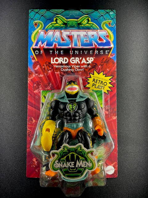 Lord Gr’Asp Masters of the Universe Origins Snake Men action figure on retro-style MOTU cardback with yellow claw and Snake Men logo