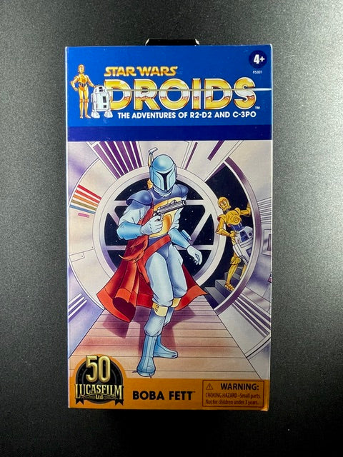 Hasbro Star Wars The Black Series Boba Fett Droids animated series 6-inch action figure in open collector packaging with blasters and accessories. Front of box. 